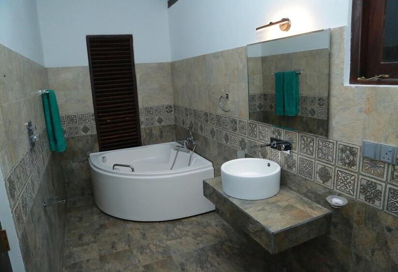 호스텔 Midigama Holiday Inn