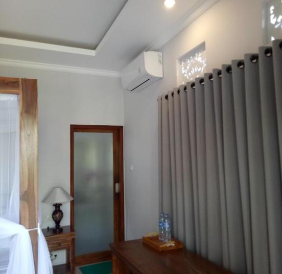 פנסיון Suryadina Guest House