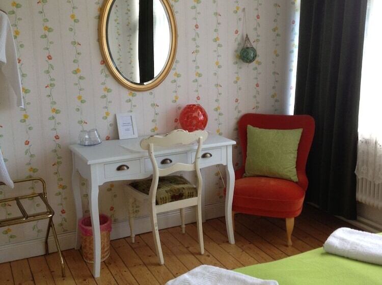 פנסיון L Floras Trädgård