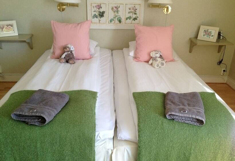 פנסיון L Floras Trädgård