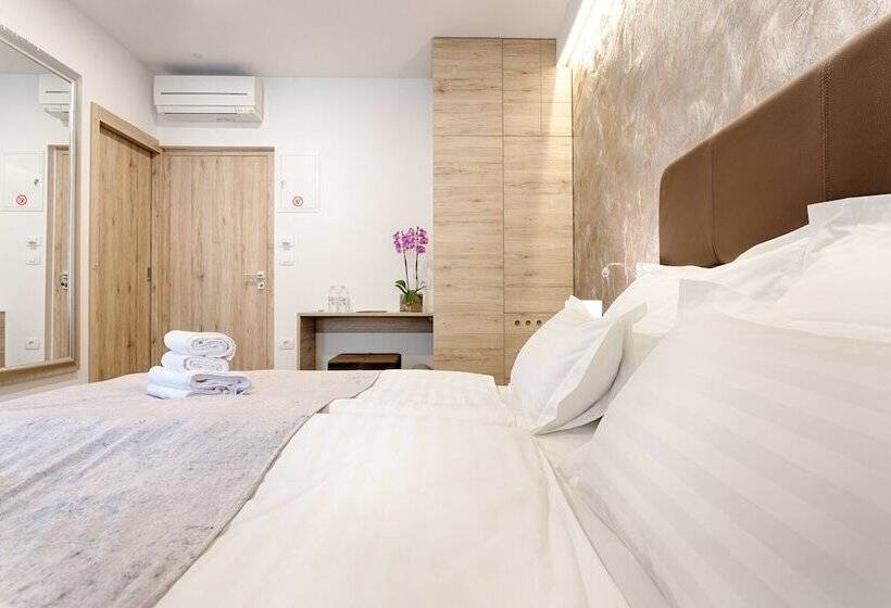 Отель Central Pearl By Nono Ban Rooms