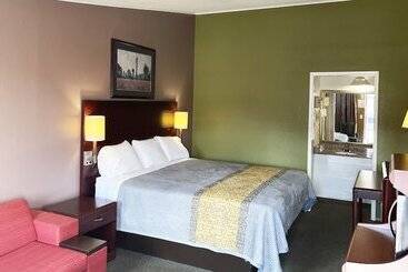 בית מלון כפרי Express Inn Thomson