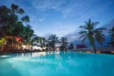 Hotell Utmt Underneath The Mango Tree Spa & Beach Resort