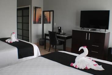 هتل The All New Grace Bay Suites