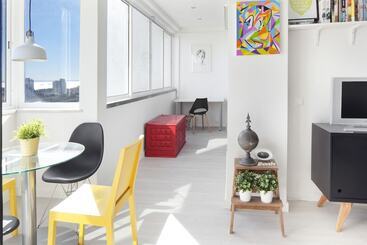 Prime Apartments White And Yellow