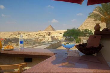 تختخواب و صبحانه Key Of Pyramids View Inn