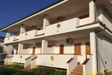 リゾートホテル Villaggio Camping La Scogliera