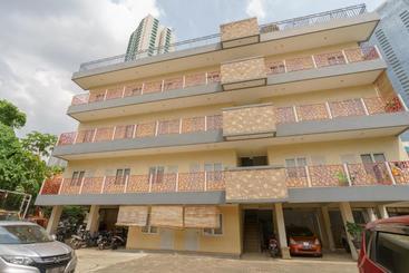 Отель Mango Suites Redpartner