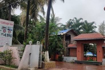 酒店 Holiday Cottage Inn