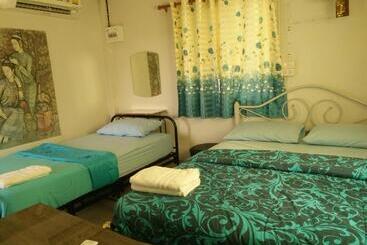 Hotel ต้งโฮมหละปูน