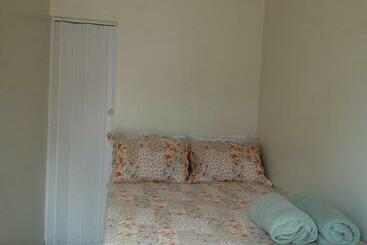 بنسيون Quarto Suíte Independente Da Casa Com Garagem