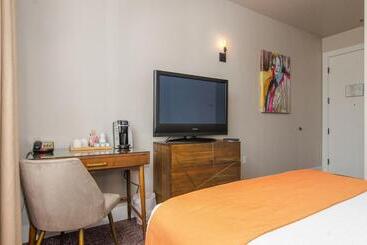 酒店 The Dundee A Trace