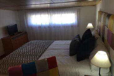 ペンション Casa Compartida