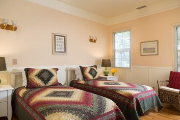 酒店 Cheshire Cat Inn & Cottages