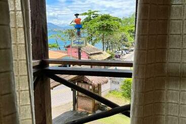 پانسیون Pousada Chalés Sinbad