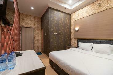 Urbanview Hotel Good Palembang By Reddoorz