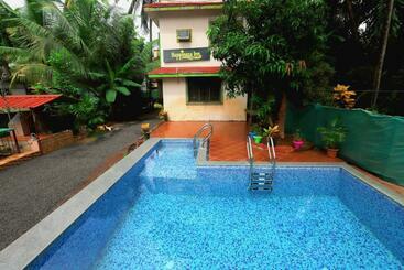 Отель Happiness Inn, Nagaon