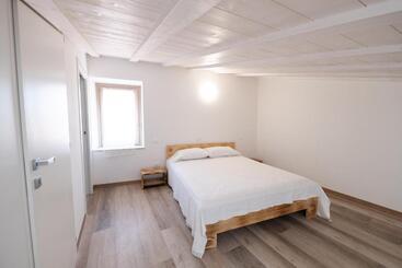 Apartamenty turystyczne Appartamento Al Campanile