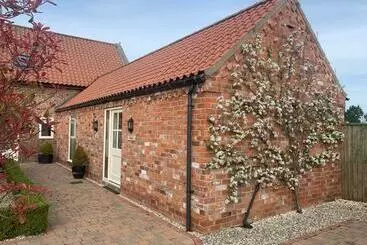ツーリストアパートメント Meals Farm Holiday Cottages   The Stables