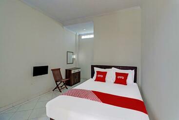 호텔 Oyo 91933 Puri Gana Residence