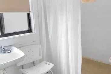 Апартаменты Carmens Inn