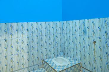 בית מלון כפרי Spot On 92246 Kost Qiu Qiu 99