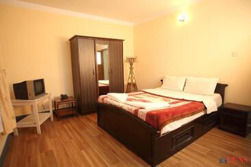 호텔 Melungtse & Apartment