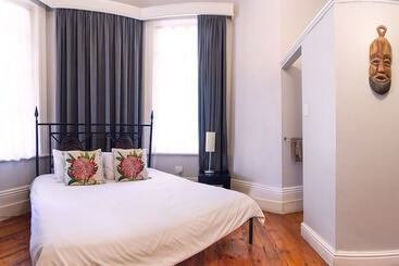 Общежитие Ashanti Gardens Guesthouse