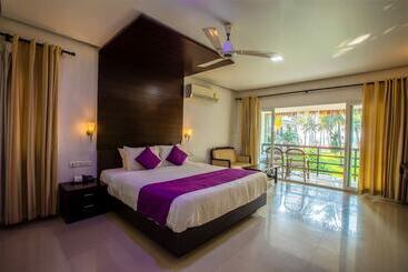 בית מלון כפרי Malabar Ocean Front Resort & Spa