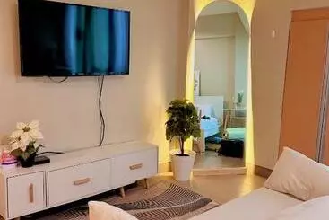 Huoneistohotelli Condotel Across Naia T3 At Two Palm Tree Villa