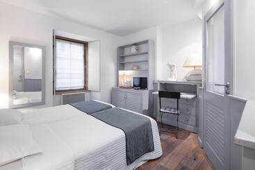 Отель La Vinotière Chambres Appartements Spa