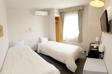 בית מלון כפרי Quincy S Inn Toyohashi