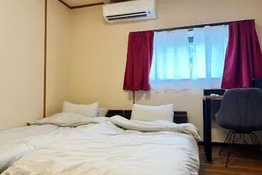 هتل آپارتمان Jinya Sunset Inn By Murasaki