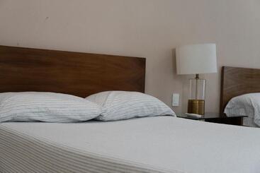 هتل آپارتمان Infinity Suites Habitación Triple 103