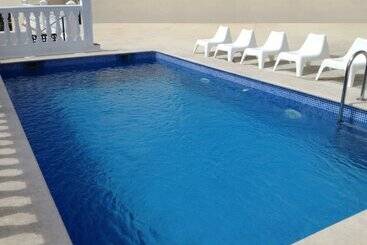 Отель Apartamentos Doña Carmen