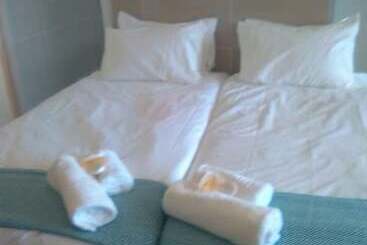 Отель Cokama Guesthouse