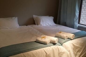 酒店 Cokama Guesthouse