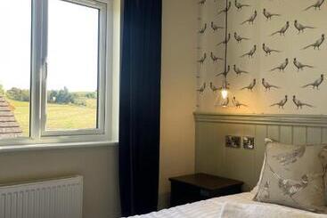 호텔 The Horseshoe And Castle