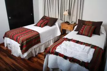 Río Arriba Suites & Apartments & Restó