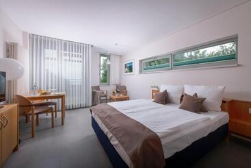 公寓式酒店  Rügener Ferienhäuser Am Hochufer