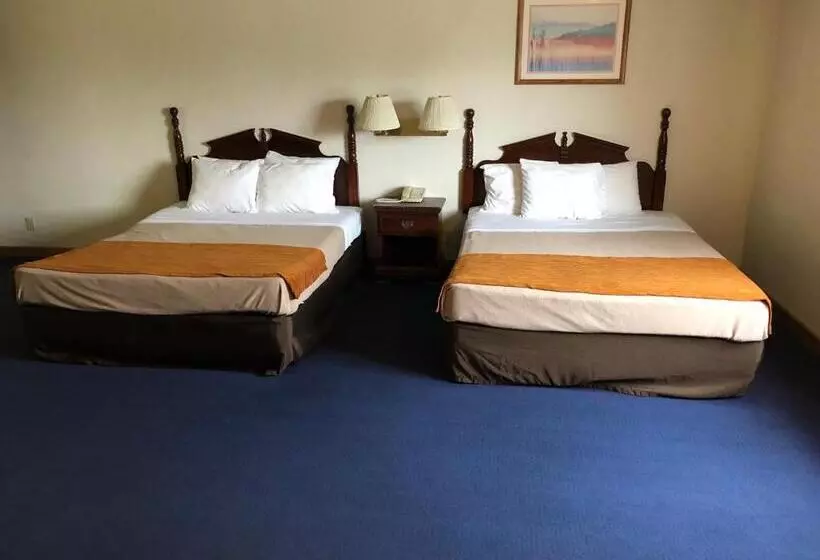 Отель Denison Inn & Suites