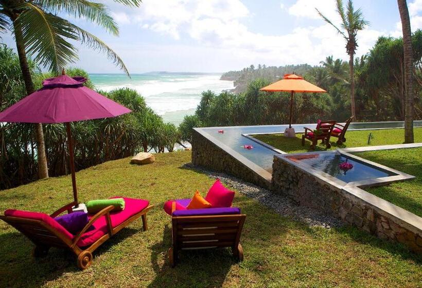 هتل Utmt Underneath The Mango Tree Spa & Beach Resort