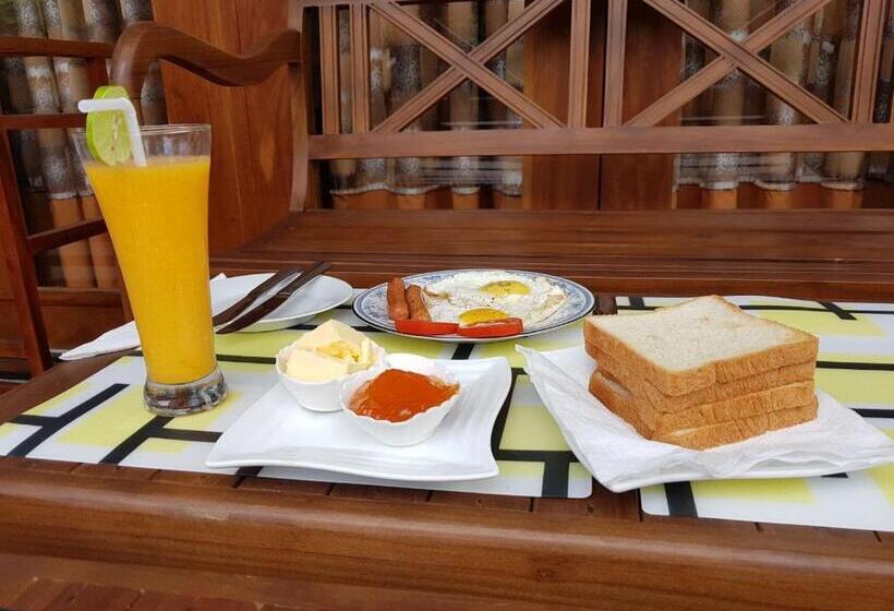 تختخواب و صبحانه Athithi Villa