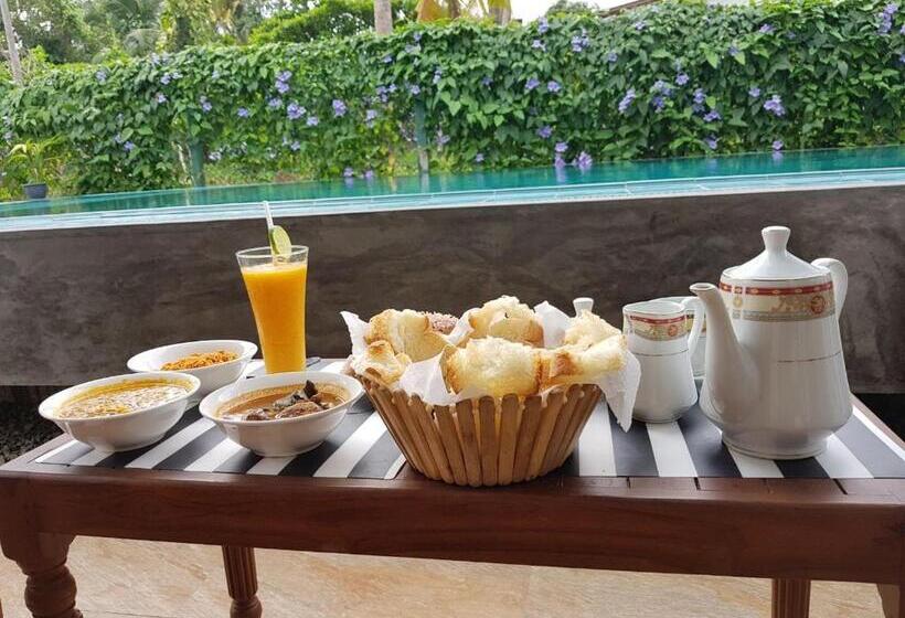 تختخواب و صبحانه Athithi Villa