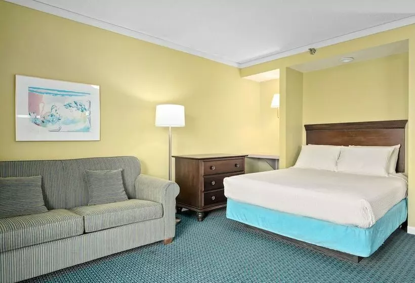 Отель Cayman Suites