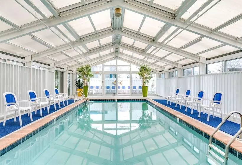 Отель Cayman Suites