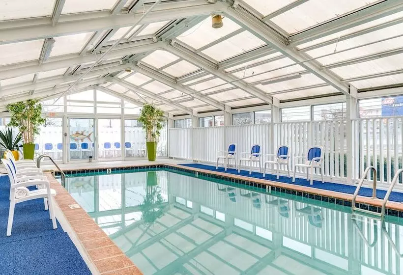 Отель Cayman Suites