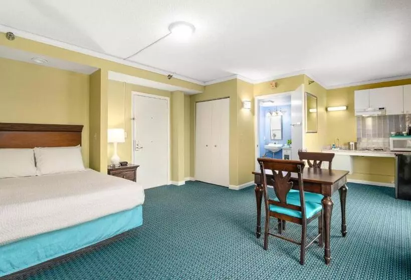 Отель Cayman Suites