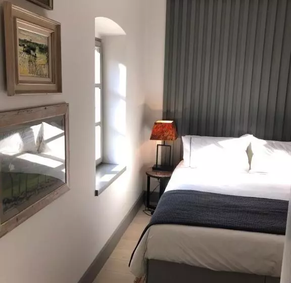 تختخواب و صبحانه Palazzo Sbutega