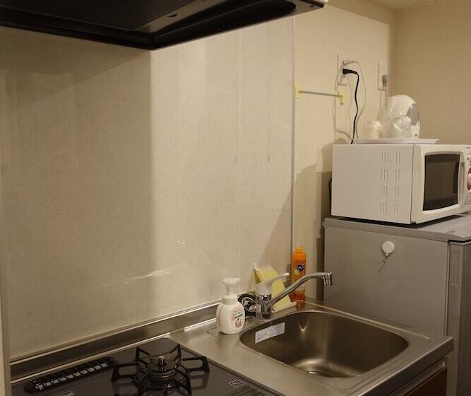 Mr. Kinjo Satomo In Ginowan